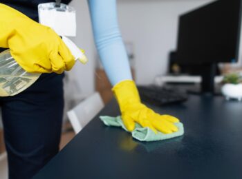 cleaning office desk wiping 8660309